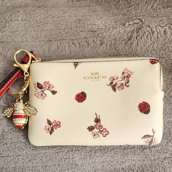 Coach Cream Wristlet with Floral and Ladybug Design - Picture 9 of 9
